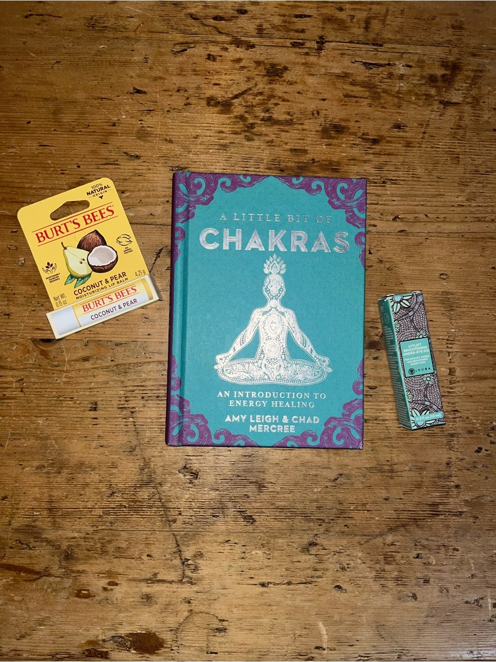 Zen pack🧘🏼‍♀️. Chakras Hardcover Book🪬, under eye oil👁️, chapstick🥥🍐